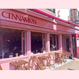 Image of a cafe shop front in Ireland with open bi-folding windows - Cinnamon Monkstown Dublin